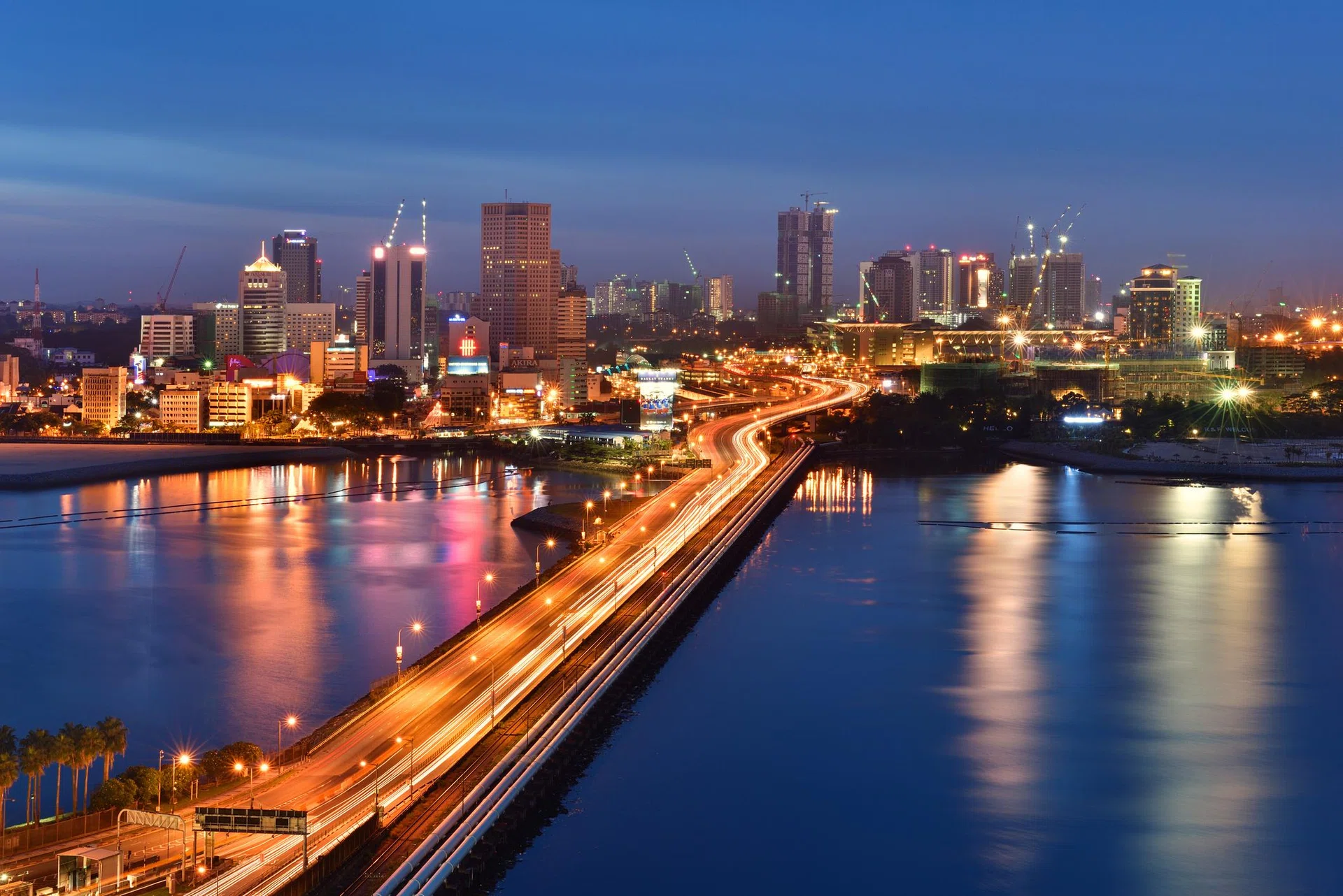 The Johor–Singapore Causeway (Chinese: 新柔长堤, Malay: Tambak Johor) is a 1056-metre causeway that links the city of Johor Bahru in Malaysia across the Straits of Johor to the town of Woodlands in Singapore. It serves as a road and rail link, as well as water piping into Singapore.

The two way Checkpoint,  is the busiest land border crossing in the world, with thousand of  people crossing in between the country everyday. The traffic is rather heavy especially evening time and weekend.