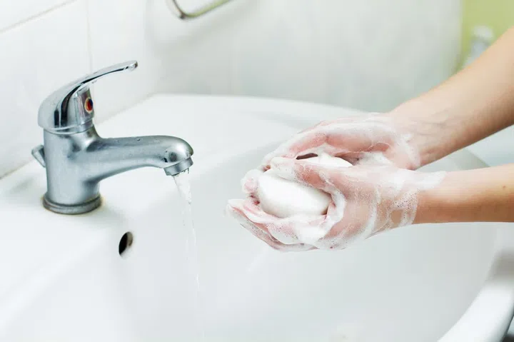 Washing Hands with soap in bathroom. Hygiene