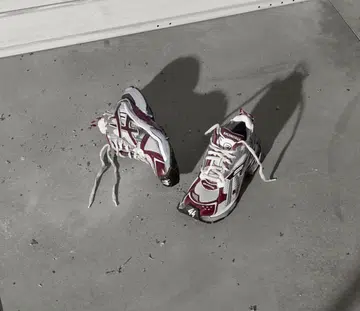 Who says flat shoes have to be boring? Cue Balenciaga's new Runner sneakers, a collage-esque amalgamation of running gear elements, with features such as cut-and-paste composition and raw edges.