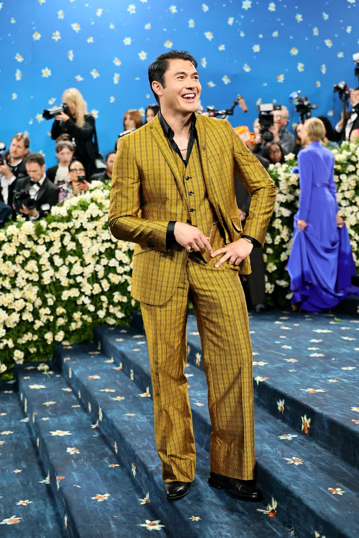 NEW YORK, NEW YORK - MAY 05: Henry Golding attends the 2025 Met Gala Celebrating "Superfine: Tailoring Black Style" at Metropolitan Museum of Art on May 05, 2025 in New York City.  (Photo by Theo Wargo/FilmMagic)