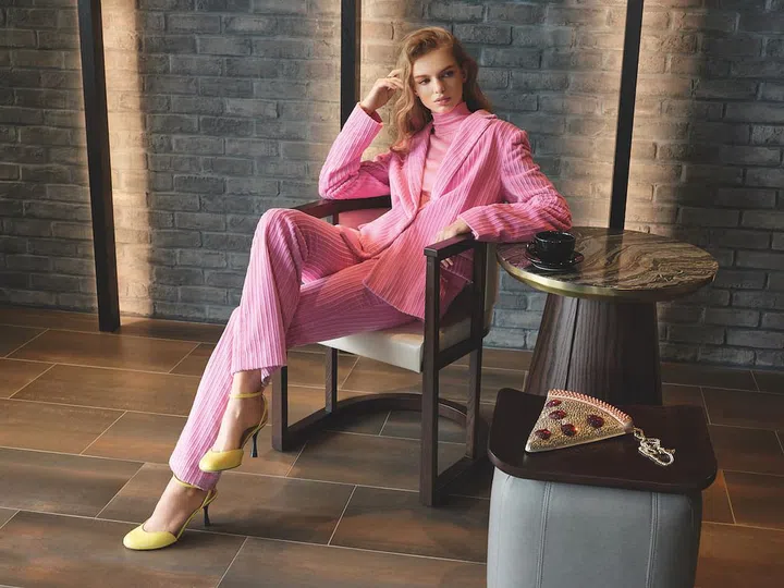 Corduroy pantsuit, Longchamp. Sheer turtleneck, Hermes. Strappy leather pumps, Loewe. Embellished purse with chain sling, Kate Spade