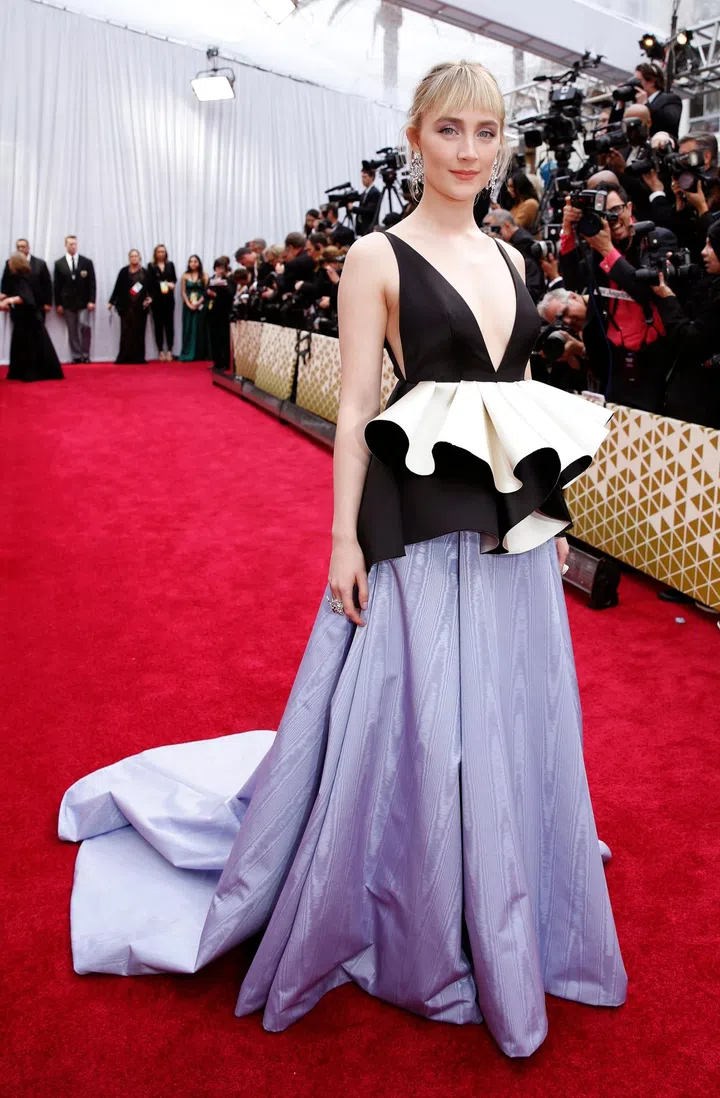 Saoirse Ronan in Gucci poses on the red carpet during the Oscars arrivals at the 92nd Academy Awards in Hollywood, Los Angeles, California, U.S., February 9, 2020. REUTERS/Mike Blake