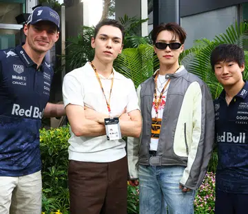 vernon dino seventeen kpop max verstappen yuki tsunoda red bull racing f1 grand prix singapore marina bay street circuit