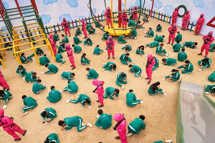 Squid Game tells the story of how 456 people play a series of childhood games with deadly twists in order to win a cash prize of 45.6 billion won (S$52 million). PHOTO: NETFLIX
