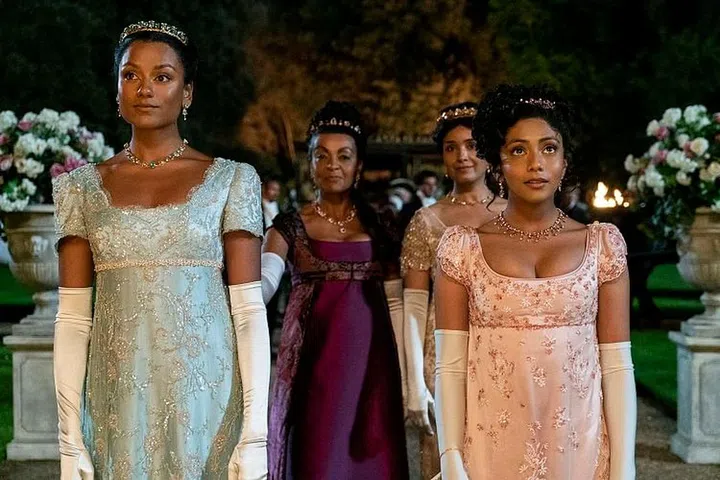 From left: Simone Ashley as Kate Sharma, Adjoa Andoh as Lady Danbury, Shelley Conn as Mary Sharma, Charithra Chandran as Edwina Sharma in episode 201 of Bridgerton. Image credit: Liam Daniel/Netflix © 2021
