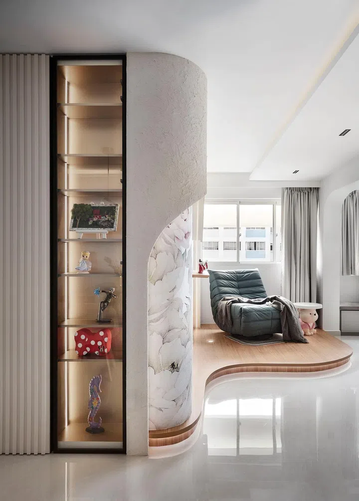 Glass display shelf in the living room in this 1,303 sq ft Tampines 5-room HDB.