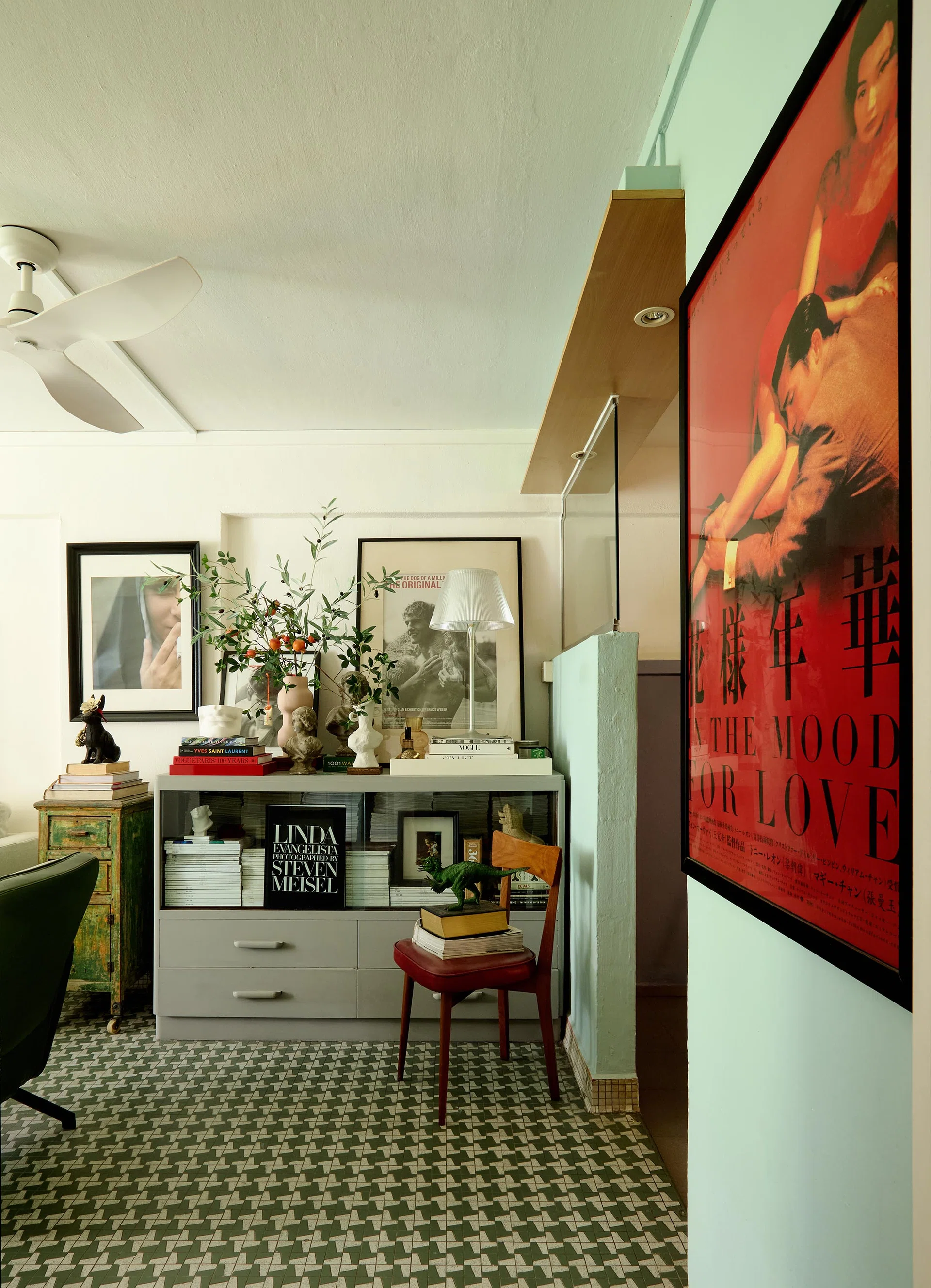 Calvin says that the old teak cabinet, which he houses his collection of fashion magazines, was salvaged from the disposal corner in his estate. He added a breath of fresh air with a coat of chalk paint. 