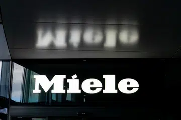 Vilnius, Lithuania - May 30, 2021: Miele brand logo on the building. Miele is German manufacturer of high-end domestic appliances and commercial equipment.