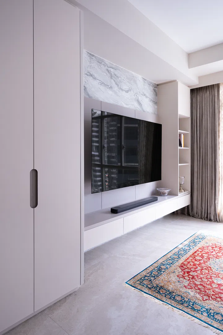 The feature wall and TV console.