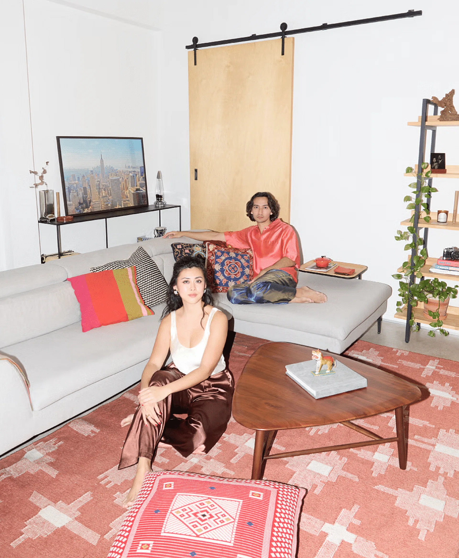 Arts manager Chua Chingyi (in foreground) and former lawyer Milon Goh (behind) are the latest disruptors to the secondary art market with their online platform Art Again, which helps those who want to sell artworks that they own do so in a democratic fashion. Credit: Athirah Annissa