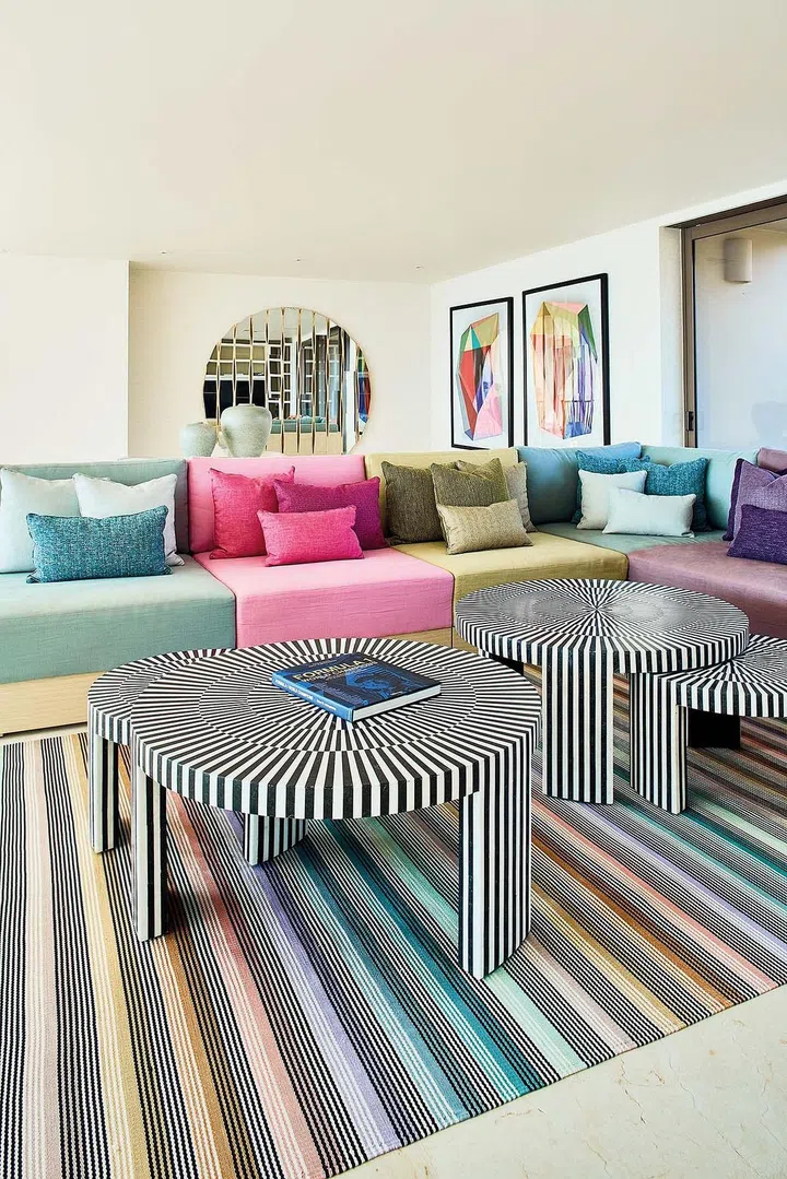 The homeowner designed the colourful sofa herself.