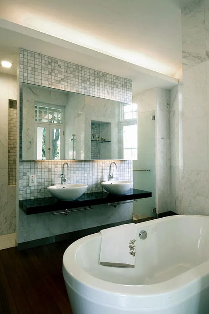 A large freestanding bathtub is the centrepiece of this luxurious space. Towel from Aussino.