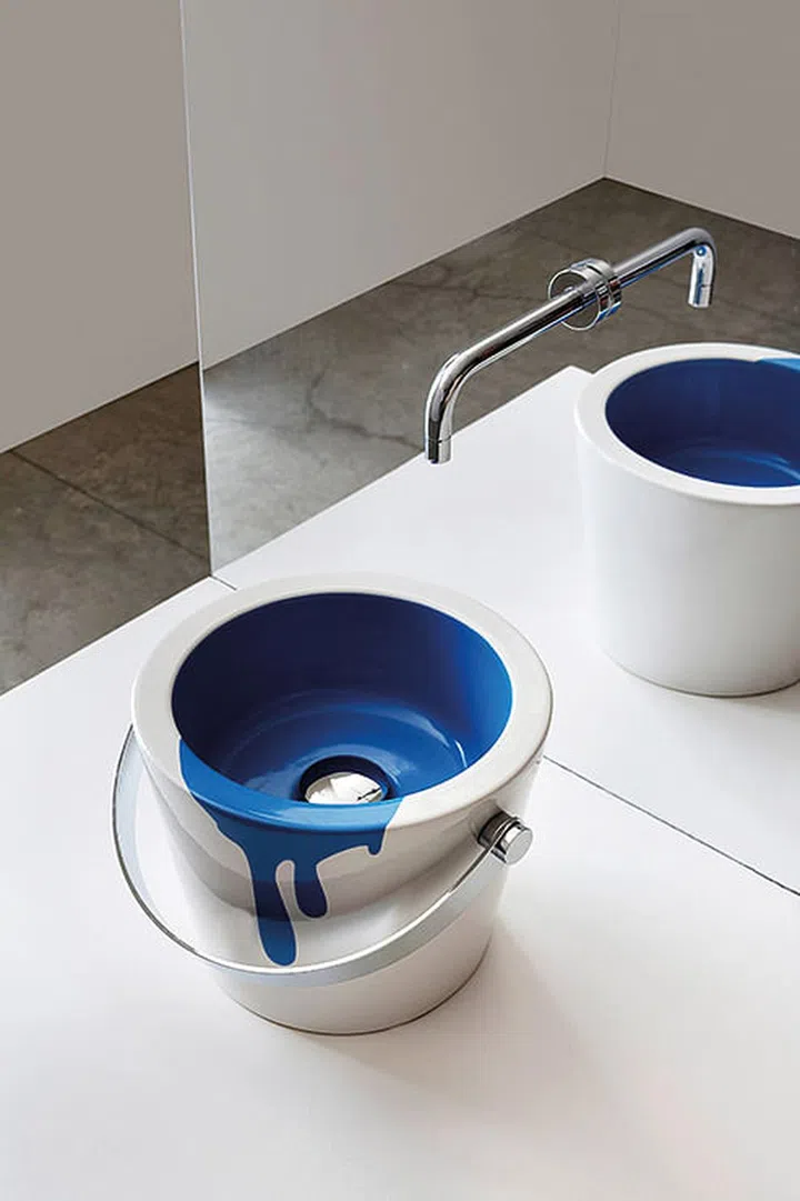 Wall-mounted tap and Bucket Basin by Italian brand Scarabeo, designed by Giovanna Talocci.