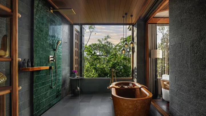 Suite bathroom in Regent Bali Canggu, designed by Hirsch Bedner Associates (HBA).