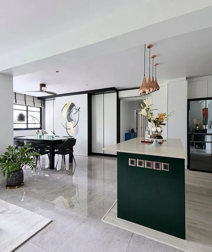 The previous homeowners had chosen to hide away the compact home bar with a pair of sliding doors. Gayatri then hired a local muralist to add an abstract piece over the otherwise barren white sliding doors.