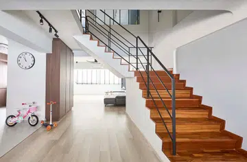 Staircase leading to the second floor in this 1,614 sq ft HDB executive maisonette at Bedok Reservoir.