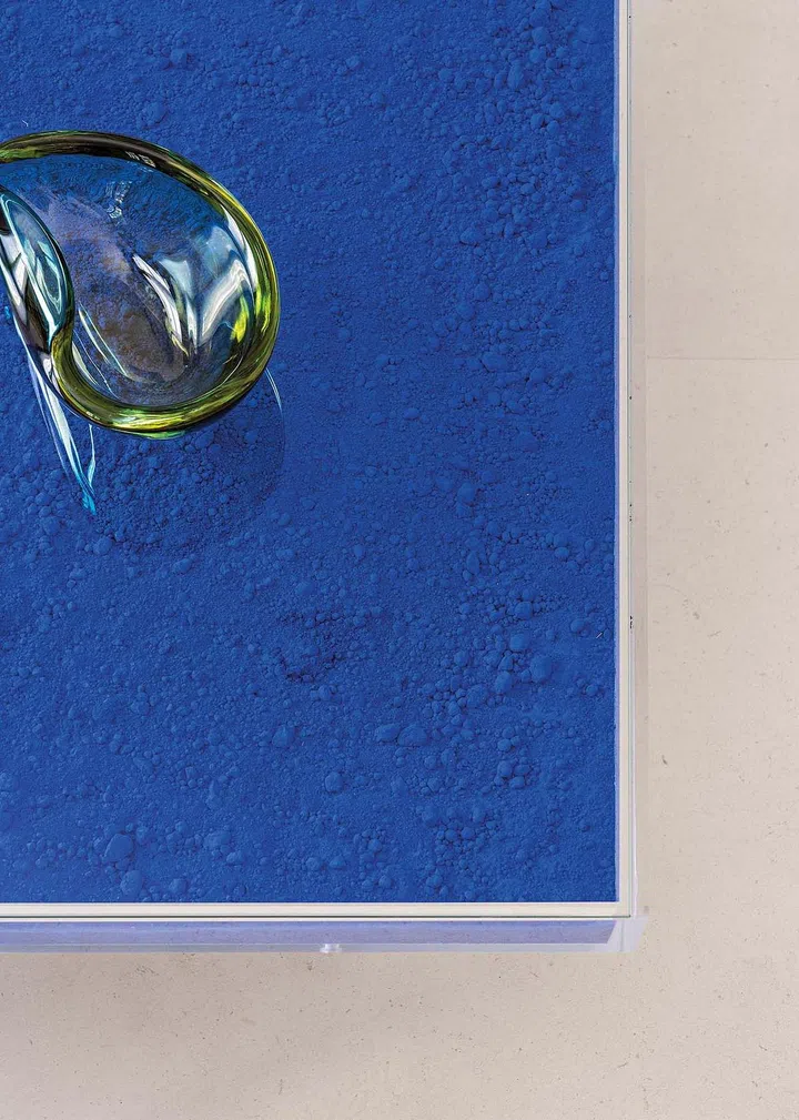Close-up of the coffee table designed by Yves Klein.