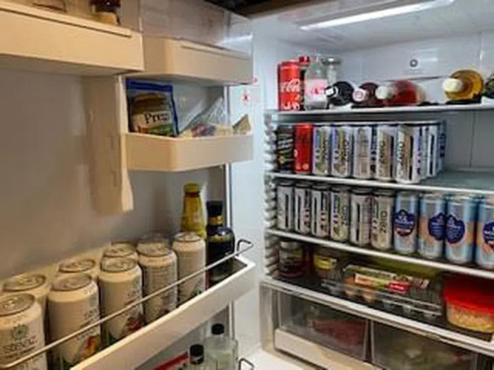 Image of a fridge stocked full of cold beverages