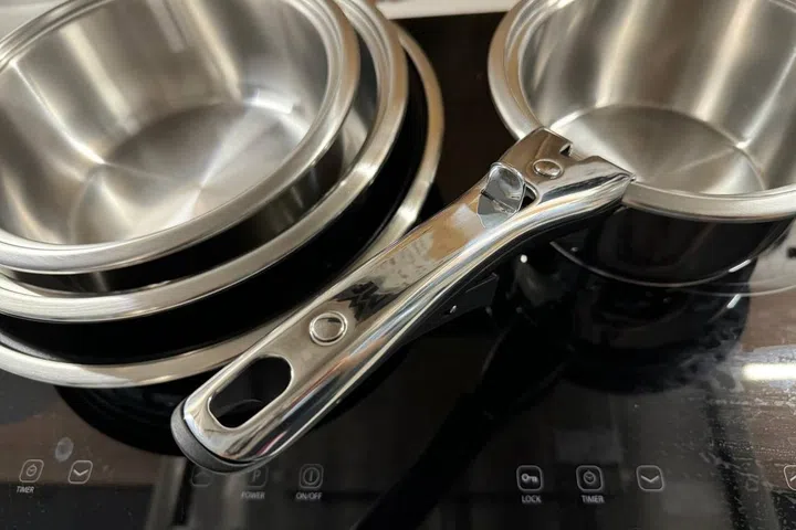 WMF Click & Serve 7-Piece set with the stainless steel looking all polished and nice.