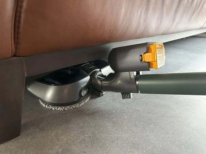 If you choose to use the steam mop function, you'll have to attach a second battery pack directly onto the mop head to power it.