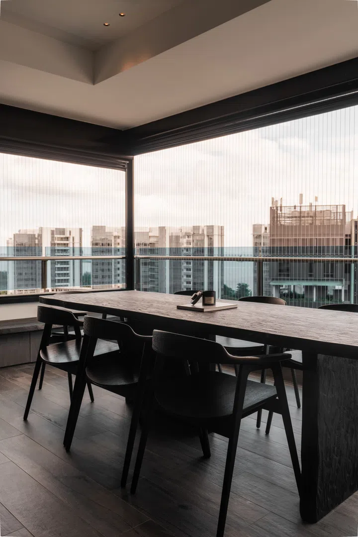 A live edge custom designed dining table by Viewport Studio and Industryplus sits in the dining room.