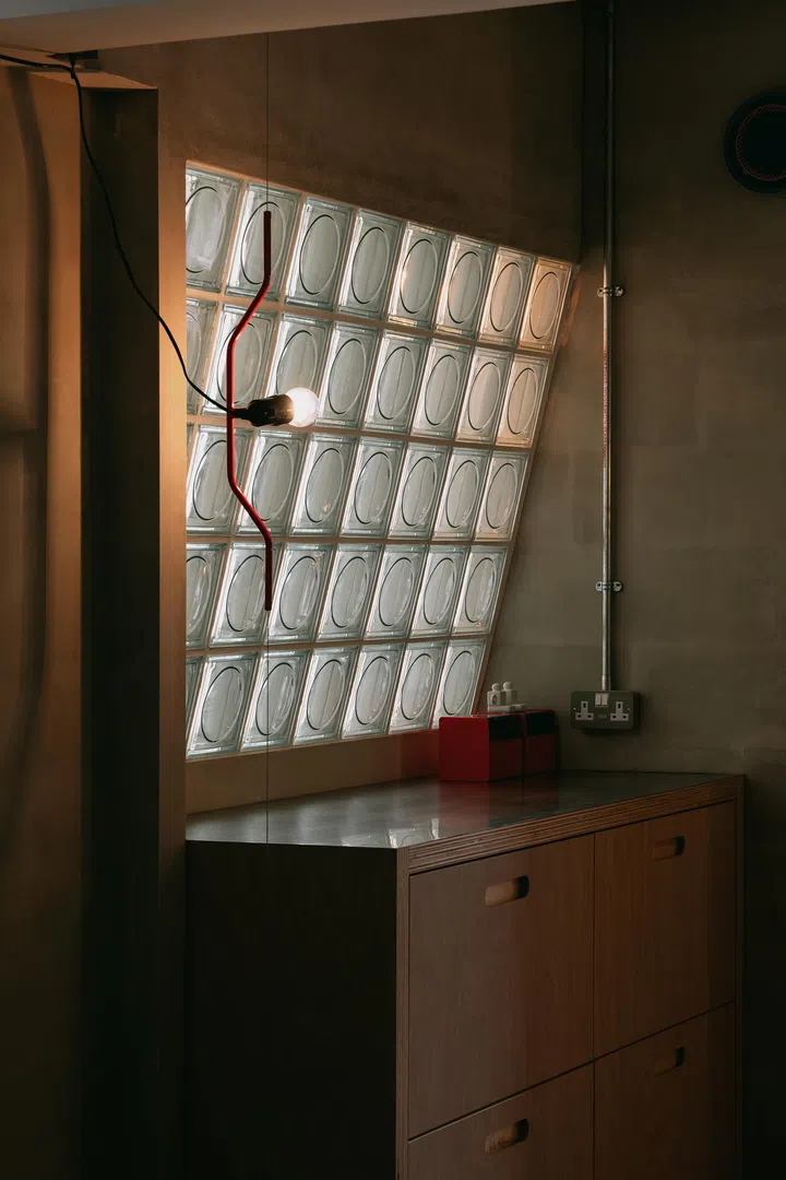 The kitchen and the slanted glass panel off the side of the kitchen.