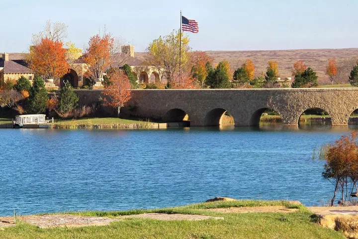 The compound includes an 11,500-square-foot lake house.