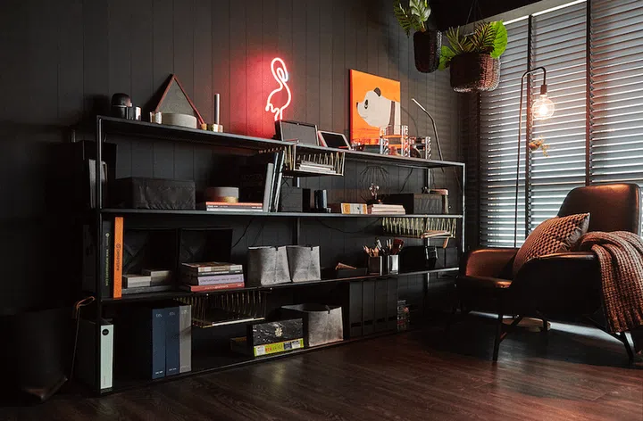 Interior designer and homeowner Sherlynn opted for the anti-scratch and anti–bacterial Fenix laminate for the walls and ceiling of the living room.