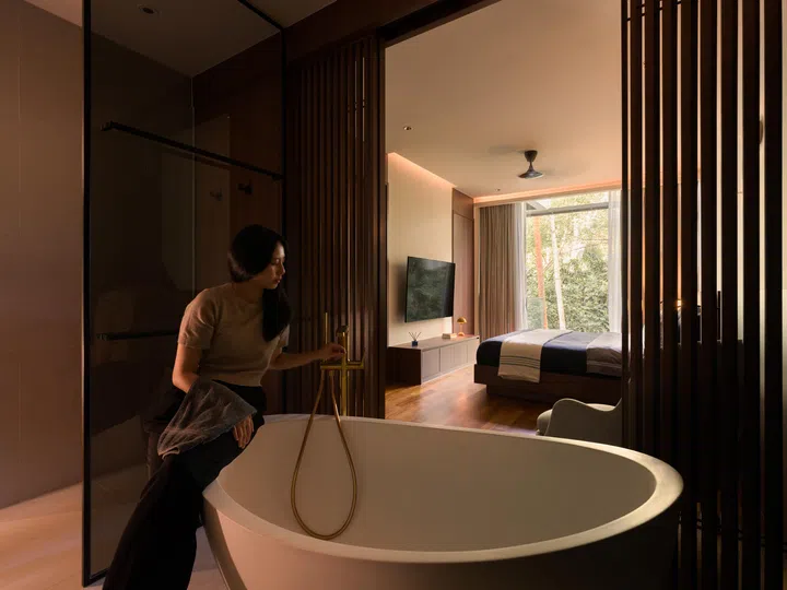 A freestanding bathtub sits in the master ensuite.