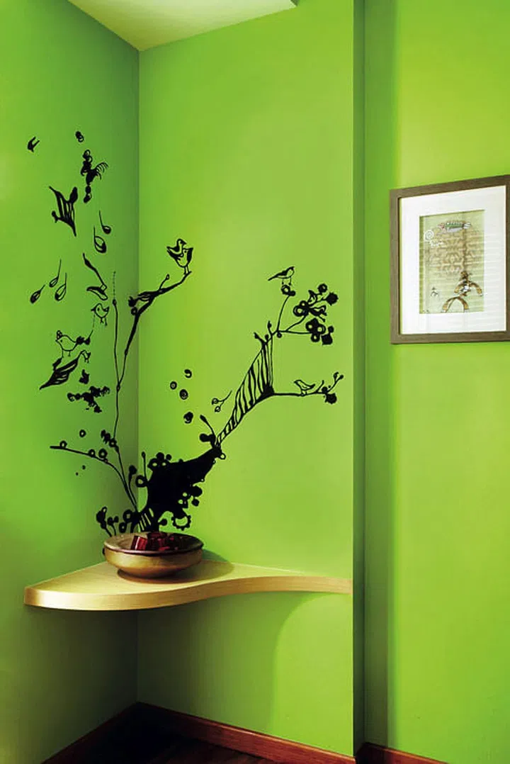 Customised wall paintings play up the Victorian-inspired theme and give this home a unique look.