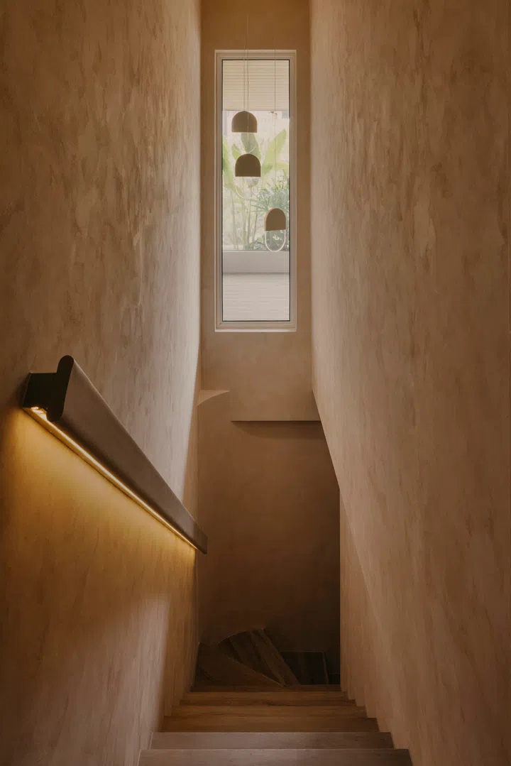 The entire home, including the staircase, is limewashed from walls to ceiling. 