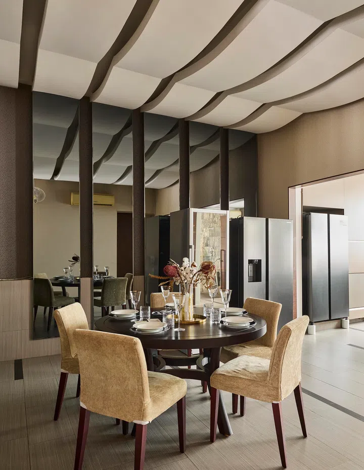 The extended family often gathers at Alec's house for Sunday dinners. They, however, prefer to dine at the outdoor porch over simple foldable tables and chairs.