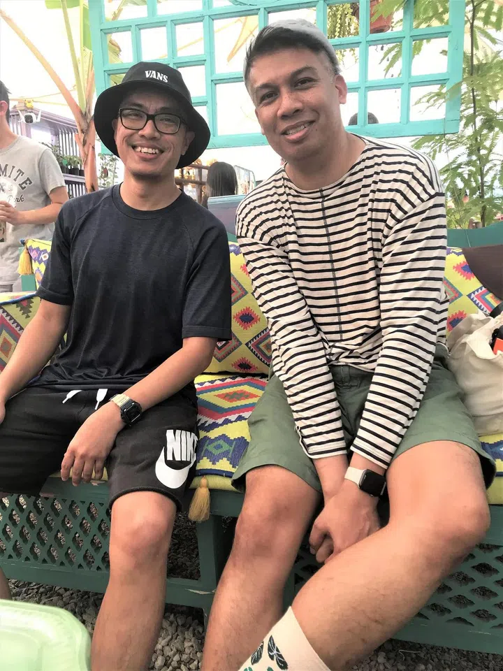 Plant hobbyists Normizan Kasimin (left) and Iskandar Nordin shopping for plants at Littlebotany nursery in Punggol. ST PHOTO: ARTHUR SIM