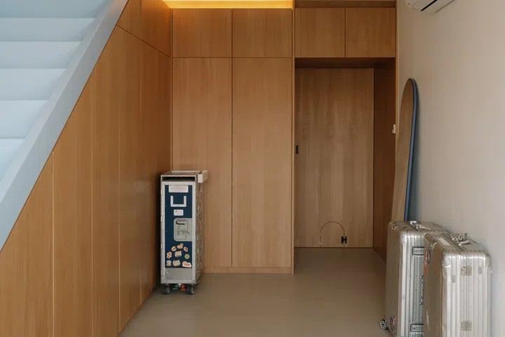 The generous open wardrobe area also doubles as a space for massage beds whenever the couple wants an in-home spa session.