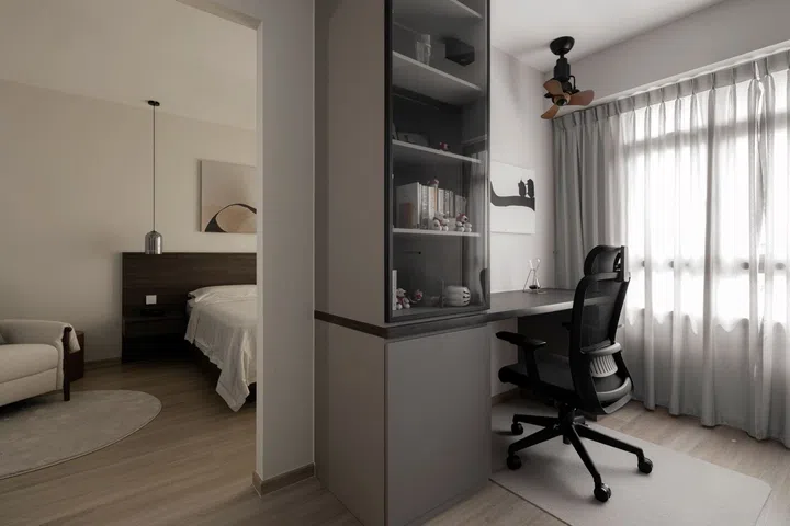 The open plan study-meets-walk-in wardrobe leads into the master bedroom. 