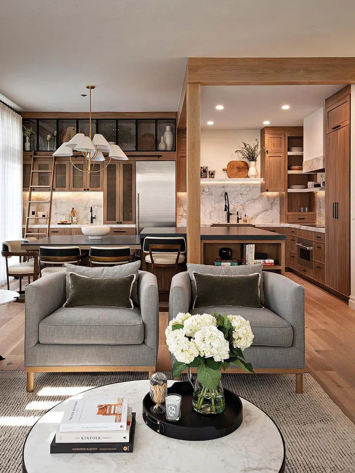 The living room is a blend of earthy tones and soft textures.