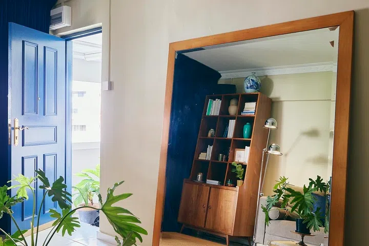Vintage furniture and thoughtful styling create a home that continues to evolve with its owner.