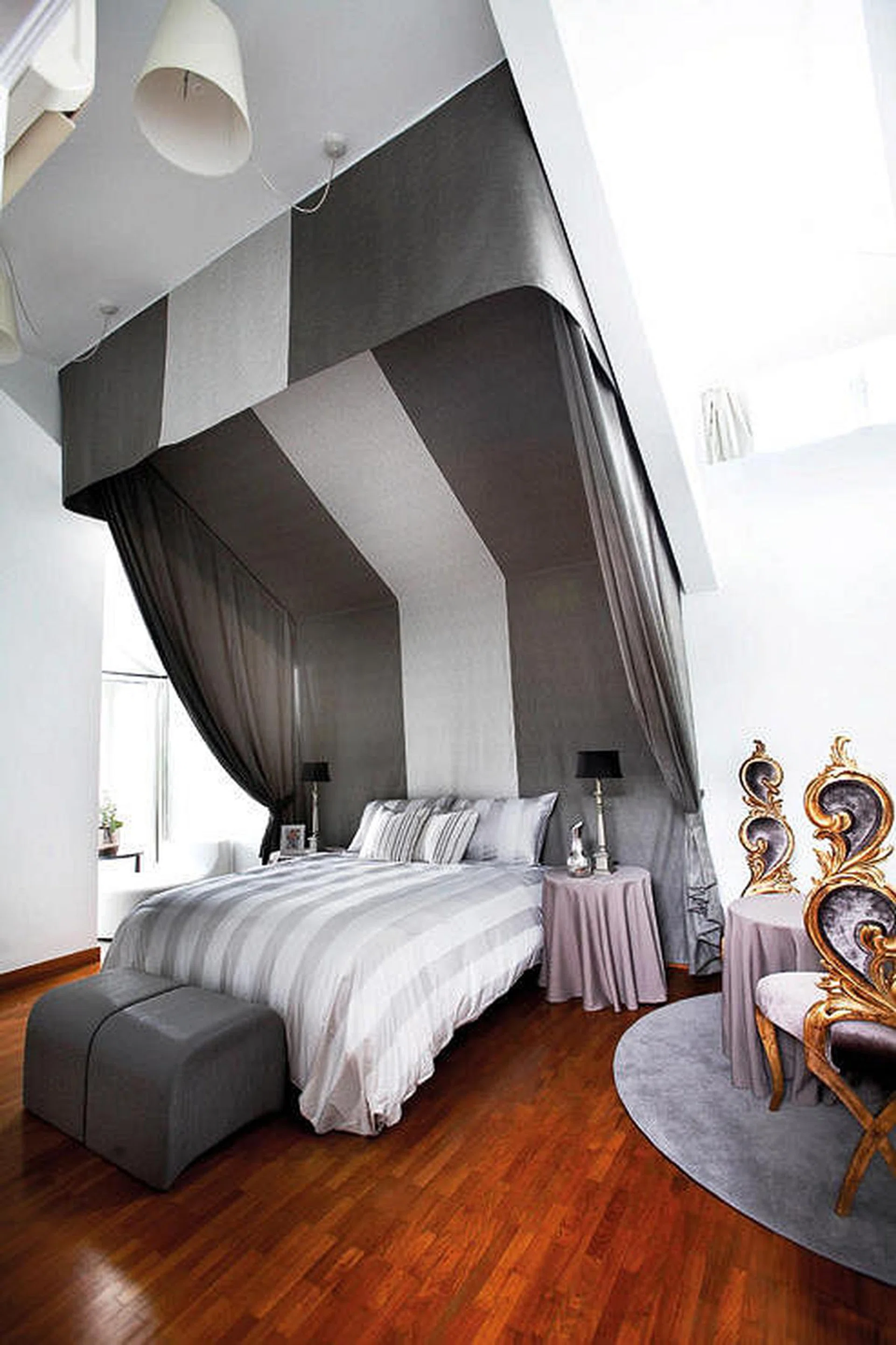 14814-splendor-photo-7-9Dramatic and inviting at the same time, this fabric canopy was created for the bed in order to bring the lofty ceilings closer towards it, creating a much cosier space to rest. interior design by Splendor.