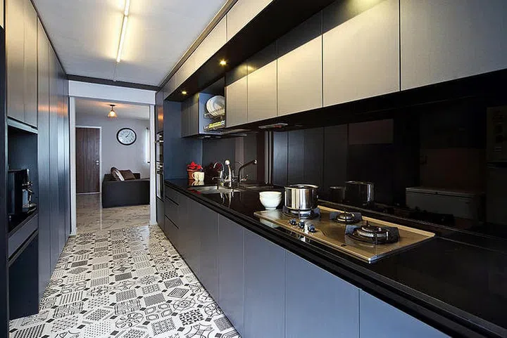 Peranakan or bohemian tiles can also give a vintage feel to the home when coupled alongside contemporary kitchen fittings, industrial elements and raw finishes such as concrete walls. Spacious yet cosy Jumbo Flat, Woodlands. Interior design by The Scientist