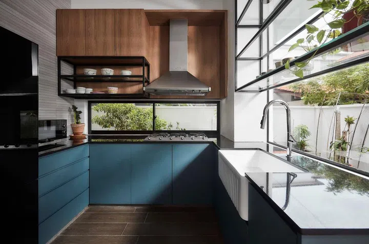 Wet kitchen overlooks a garden that runs down the length of this 3,990 sq ft semi-detached home at Frankel Estate.