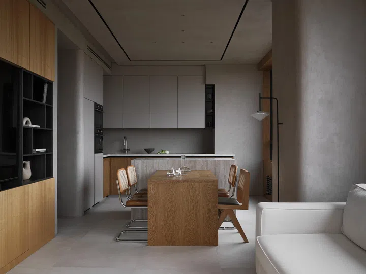 Looking inwards, the kitchen, dining and living room all share the same structural space yet each appears as its own zone. 