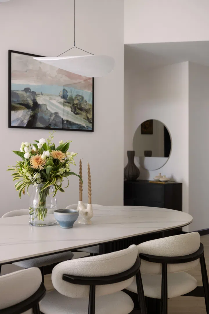 A custom made 2.4-metre long sintered stone dining table.