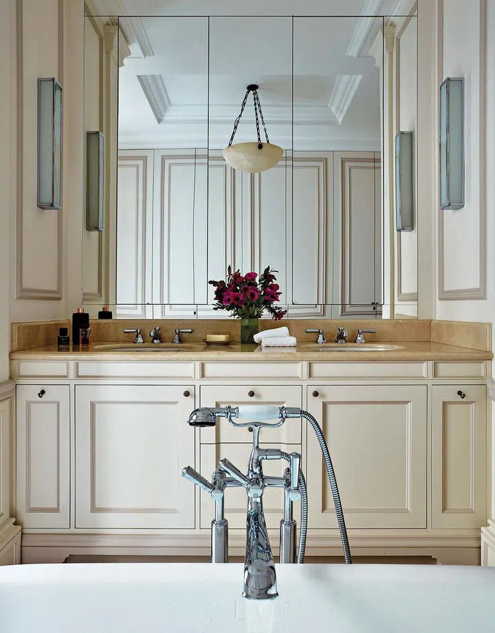 Designed for functionality, the counter in the master bathroom features a his and hers sink layout with plenty of storage space underneath.