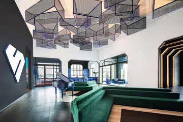 Doors and windows are designed in an iconic crystalline shape that derives from the look of the brand’s logo at Sapphire Windows Singapore showroom.