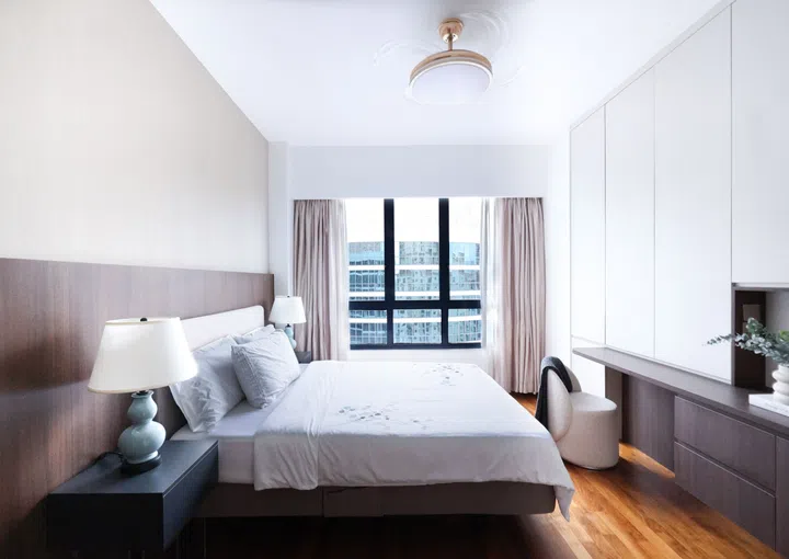 The use of neutral and cool tones evoke a calming mood in the master bedroom. 