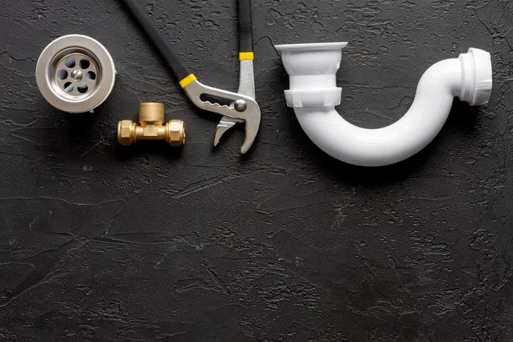 concept plumbing work top view on dark background