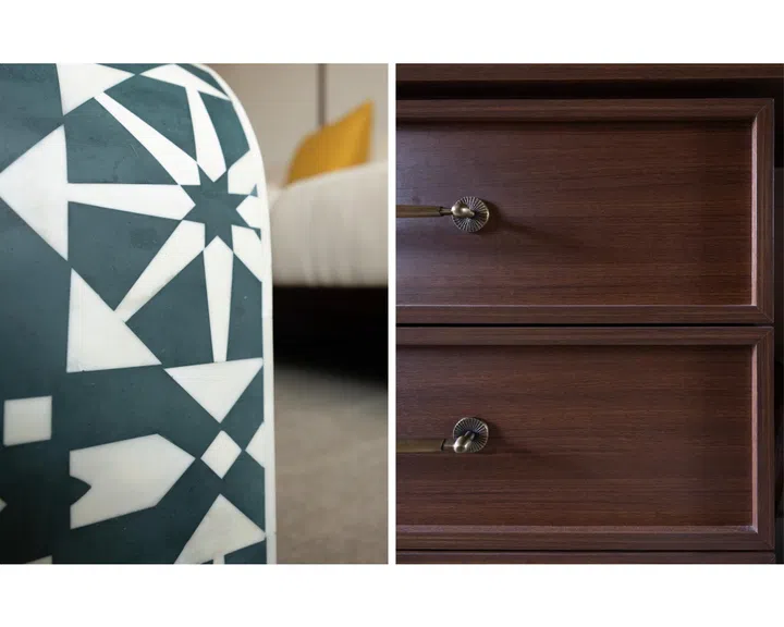 This home features bold prints and dark, teak woods. 