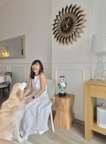 Amelia and her golden retriever, Yuki. 
