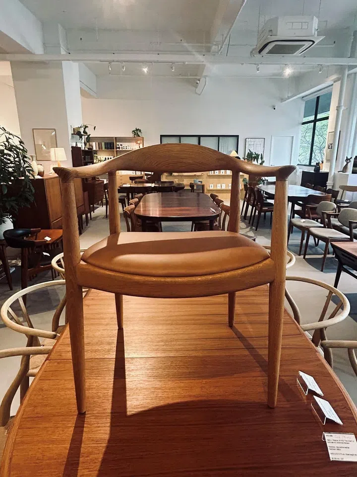 An original The Round Chair by Hans Wegner was the unexpected seed that Noden's business stems from. It takes up a significant position on a table in the middle of their showroom. Image by Isabel Lim