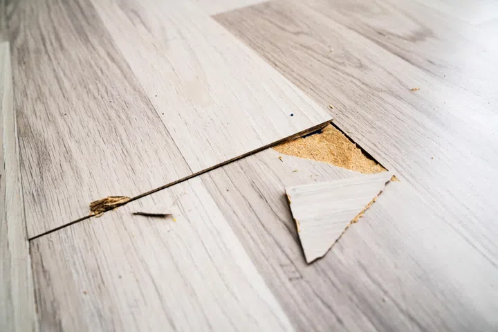 Vinyl holds up well to everyday life, but scratch-resistant does not mean damage-proof—especially when heavy furniture is dragged across the surface.